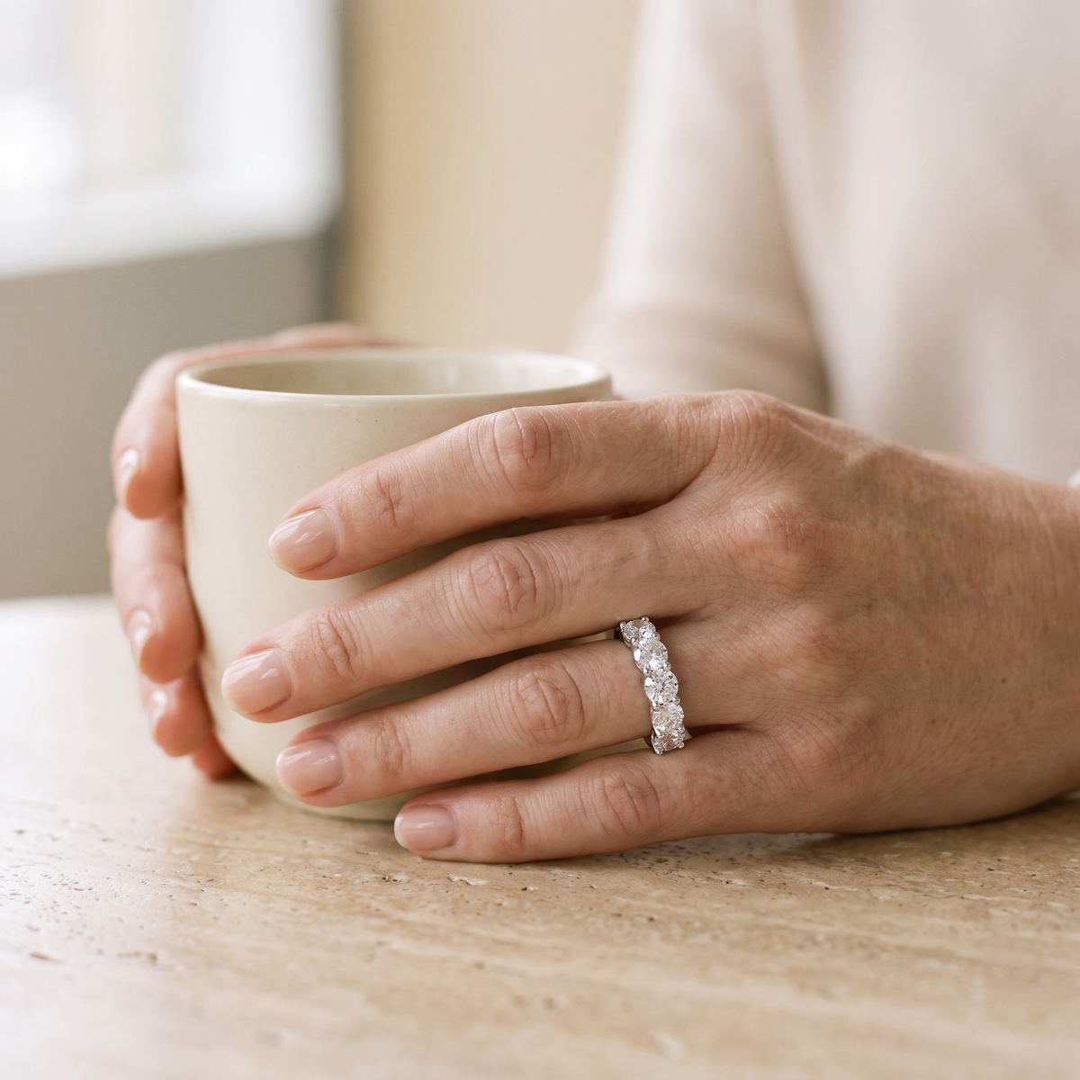 Alliance Five-Stone Moissanite Wedding Band, worn by a woman