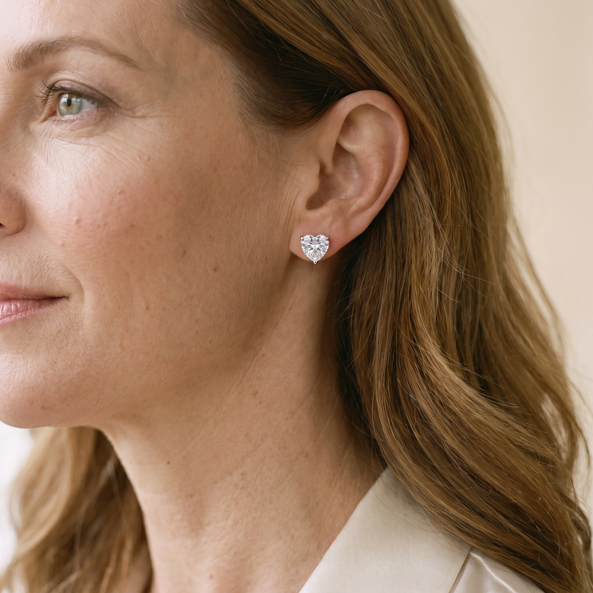Amélie Heart-Cut Moissanite Studs, worn by a woman