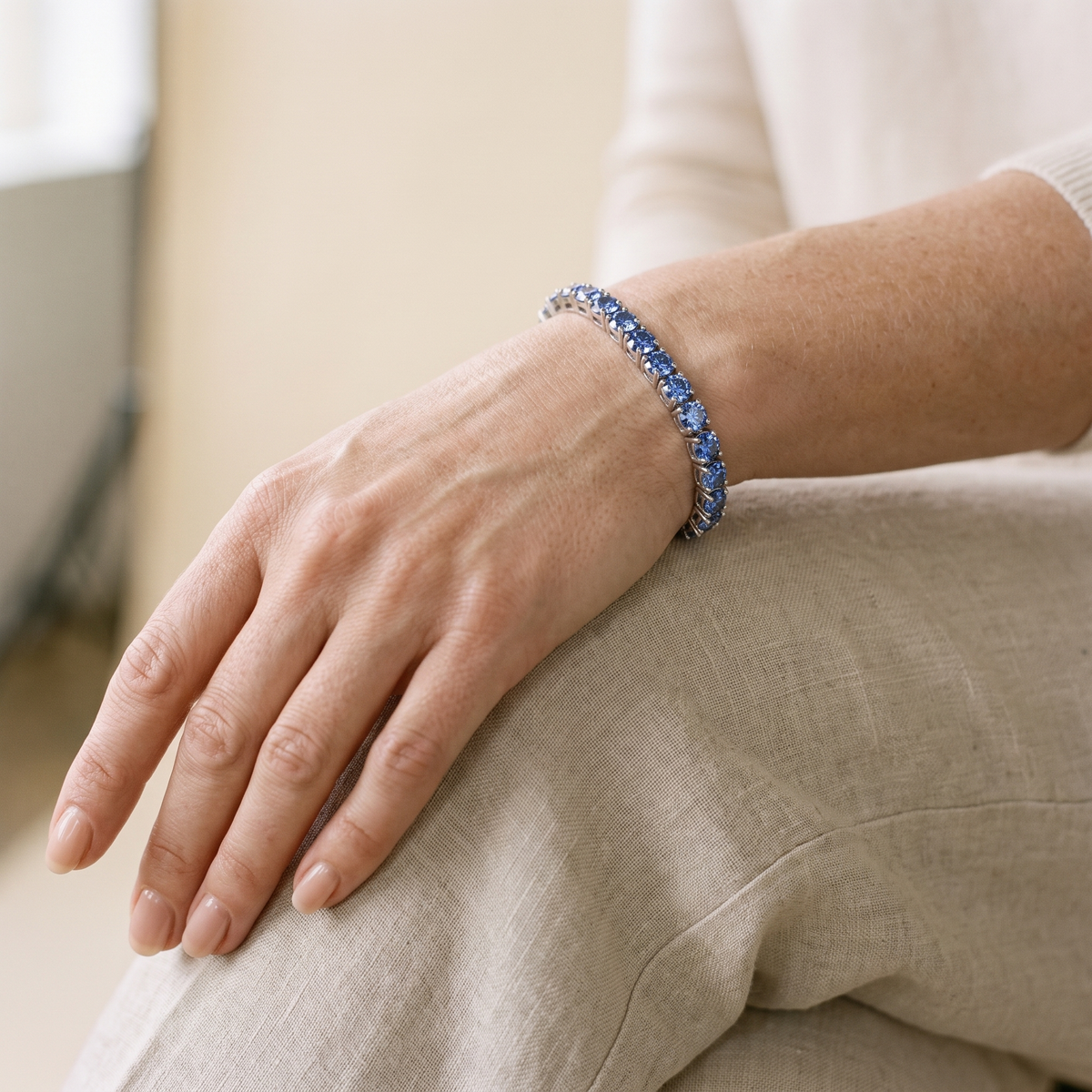 Azur Blue Moissanite Tennis Bracelet, worn by a woman