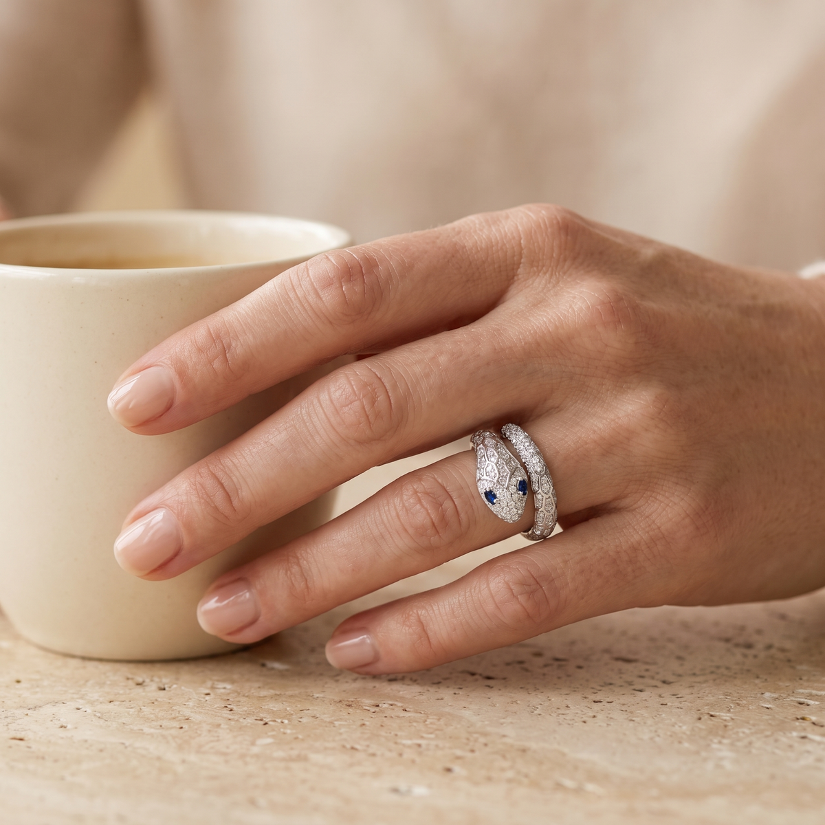 Azura Blue-Eyed Moissanite Snake Ring, worn by a woman