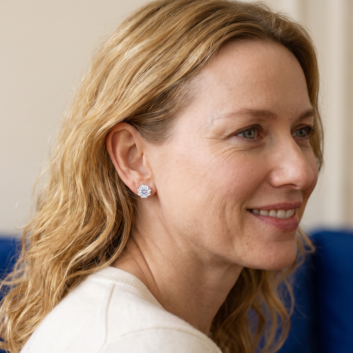 Camélia Moissanite Flower Studs, worn by a woman