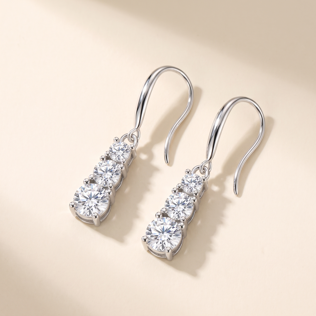 Cascade Three-Stone Moissanite Drop Earrings in 18K White Gold