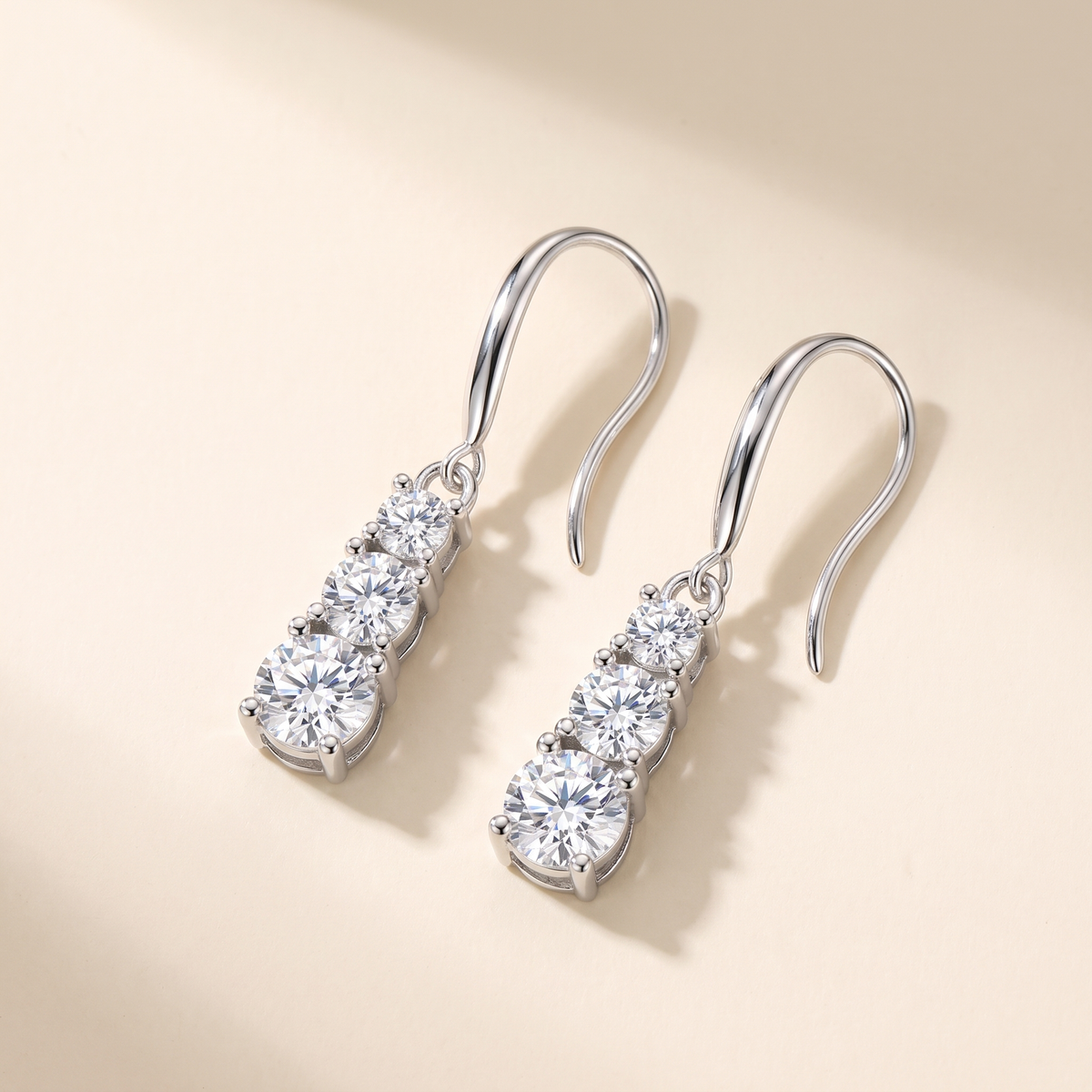 Cascade Three-Stone Moissanite Drop Earrings in 18K White Gold