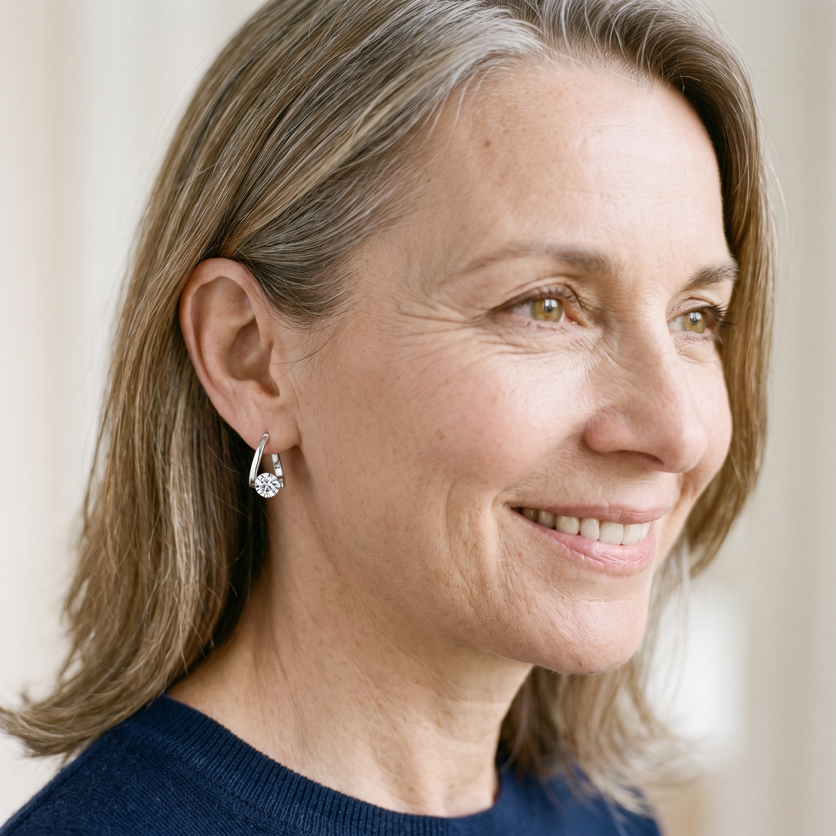 Croisette Moissanite Crossover Hoops, worn by a woman