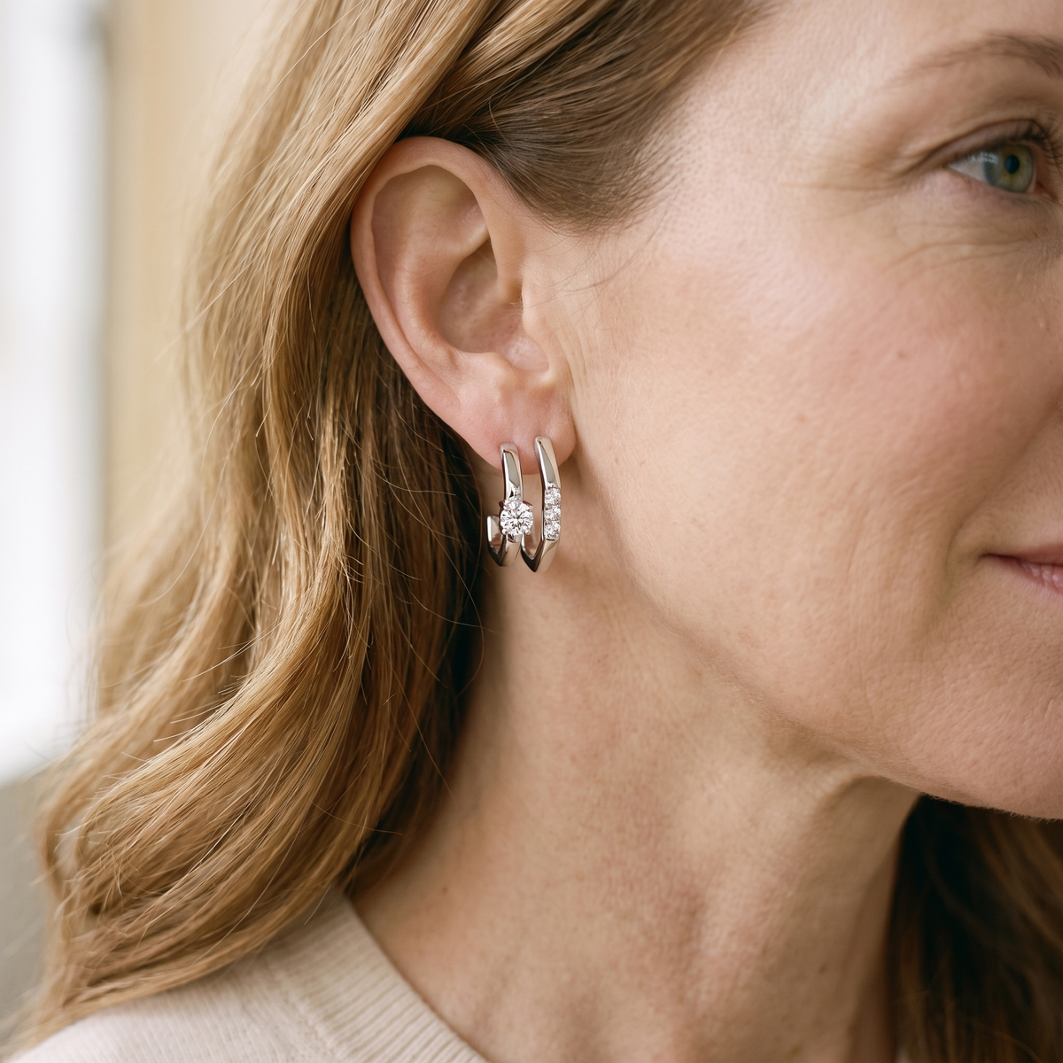 Duetto Moissanite Double Hoops, worn by a woman