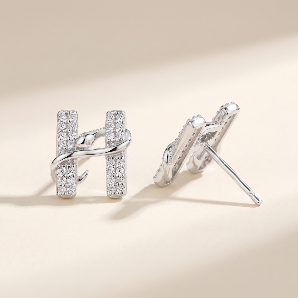 Hermine Moissanite H Snake Studs in White Gold