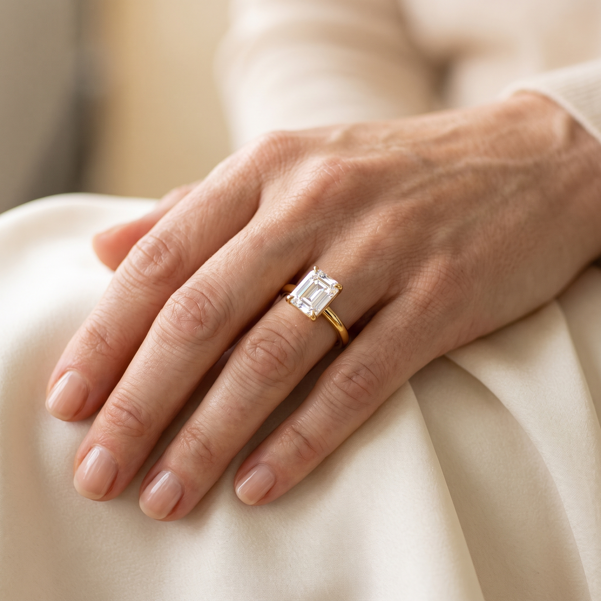 Joséphine Emerald-Cut Moissanite Engagement Ring, worn by a woman