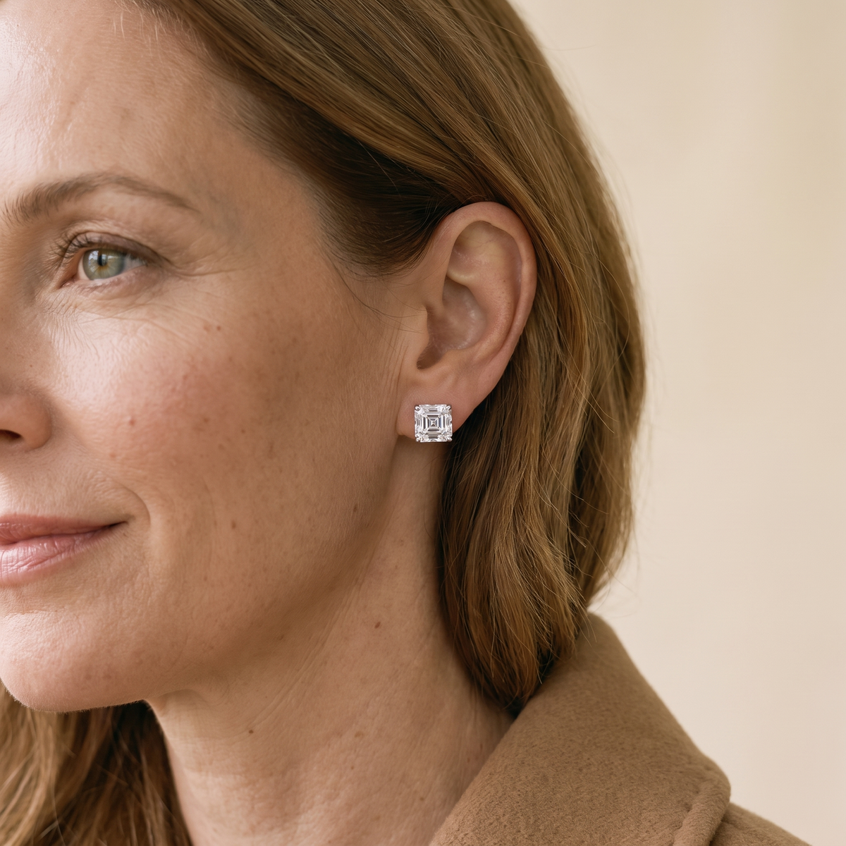Lucienne Asscher-Cut Moissanite Studs, worn by a woman