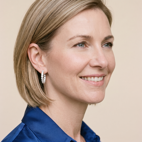 Lune Moissanite Pavé Hoops, worn by a woman