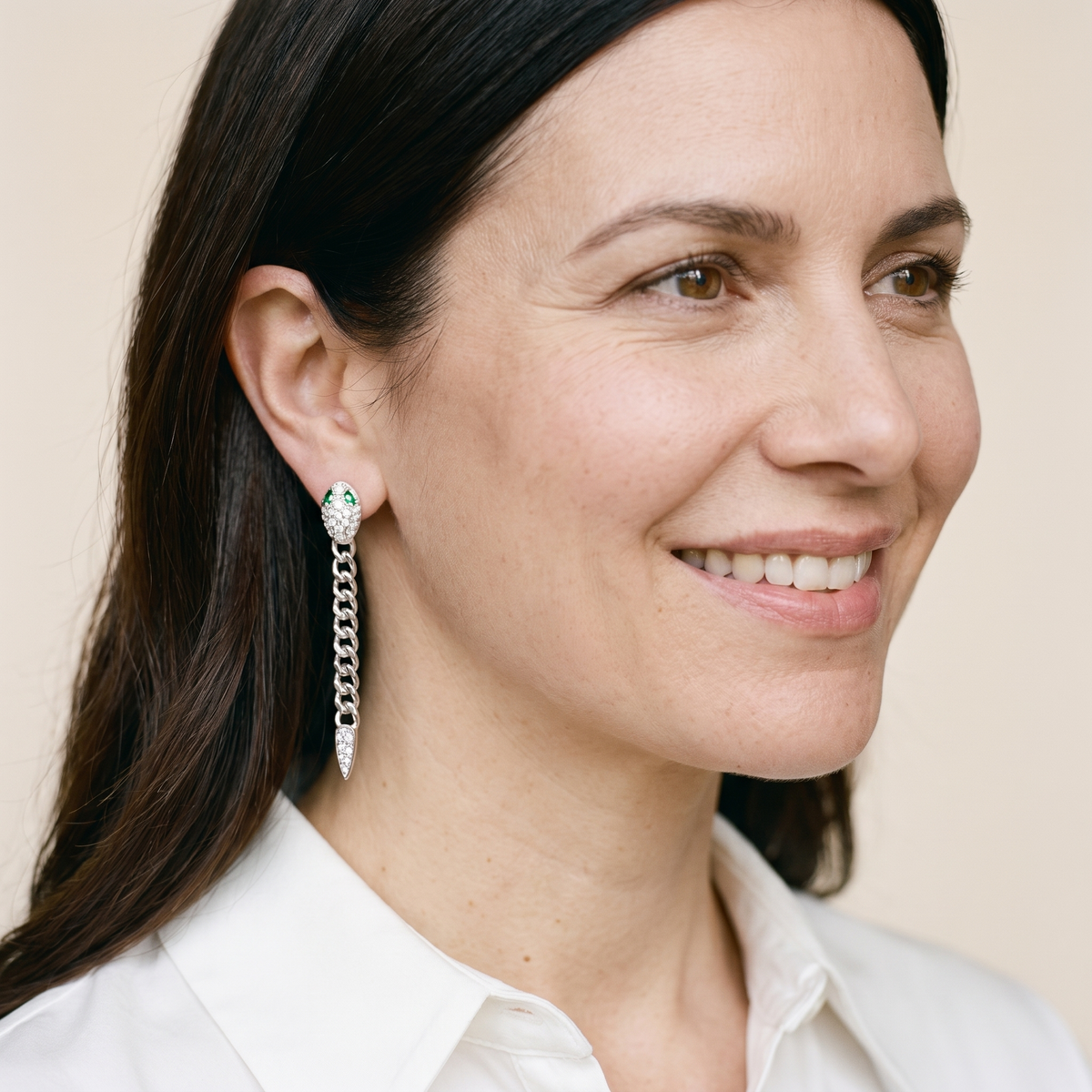 Mélusine Moissanite Snake Drop Earrings, worn by a woman