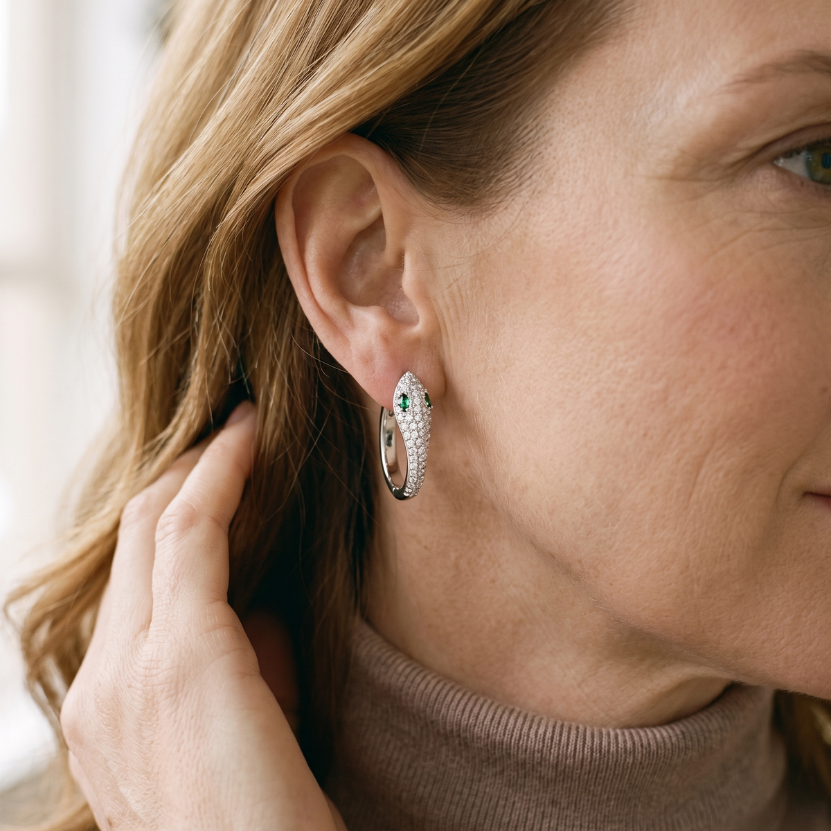 Mélusine Moissanite Snake Hoops, worn by a woman