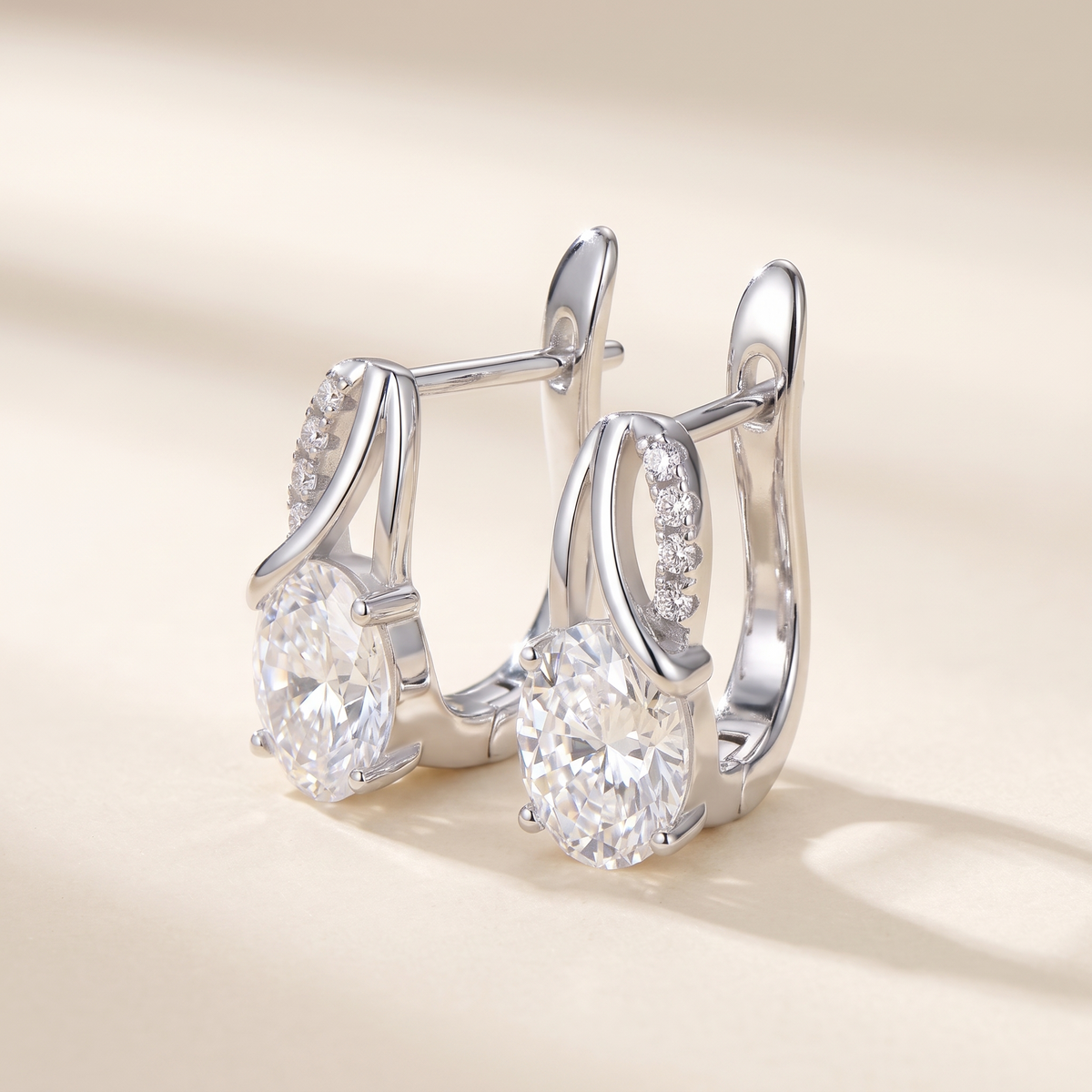 Olympe Oval Moissanite Huggies in White Gold