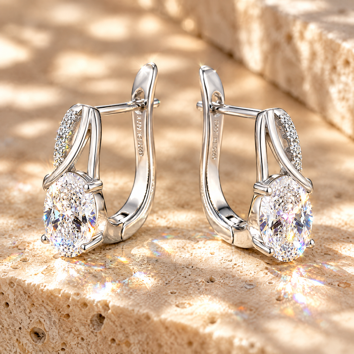 Olympe Oval Moissanite Huggies, close-up detail