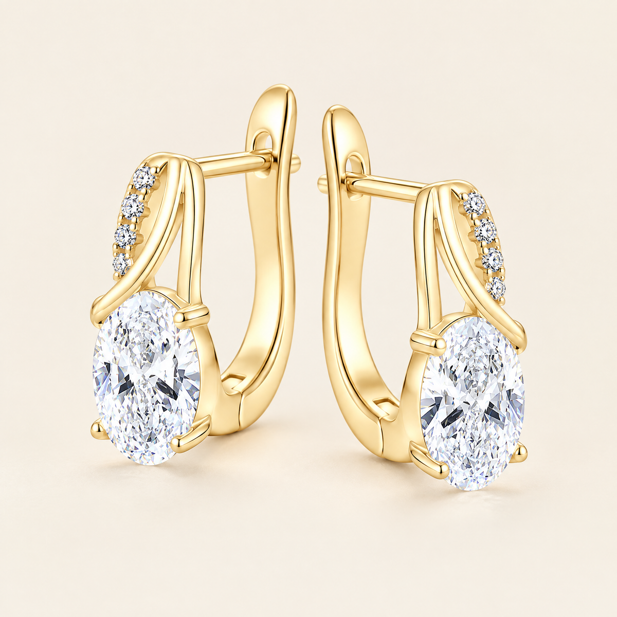 Olympe Oval Moissanite Huggies in Yellow Gold