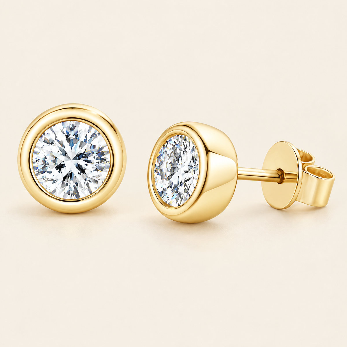 Orbe Bezel Moissanite Studs in Yellow Gold
