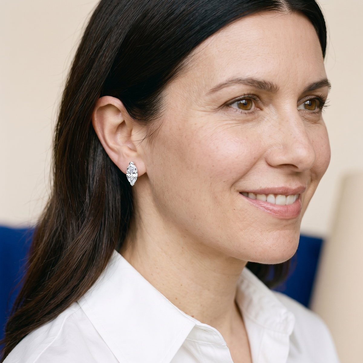 Pompadour Marquise-Cut Moissanite Studs, worn by a woman