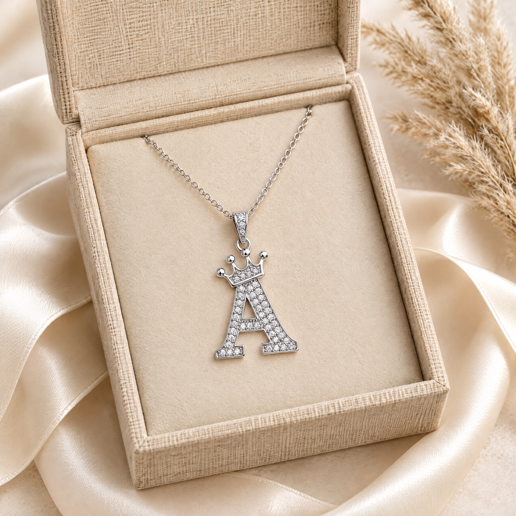 Reine Moissanite Crown Initial Necklace, presented in a box