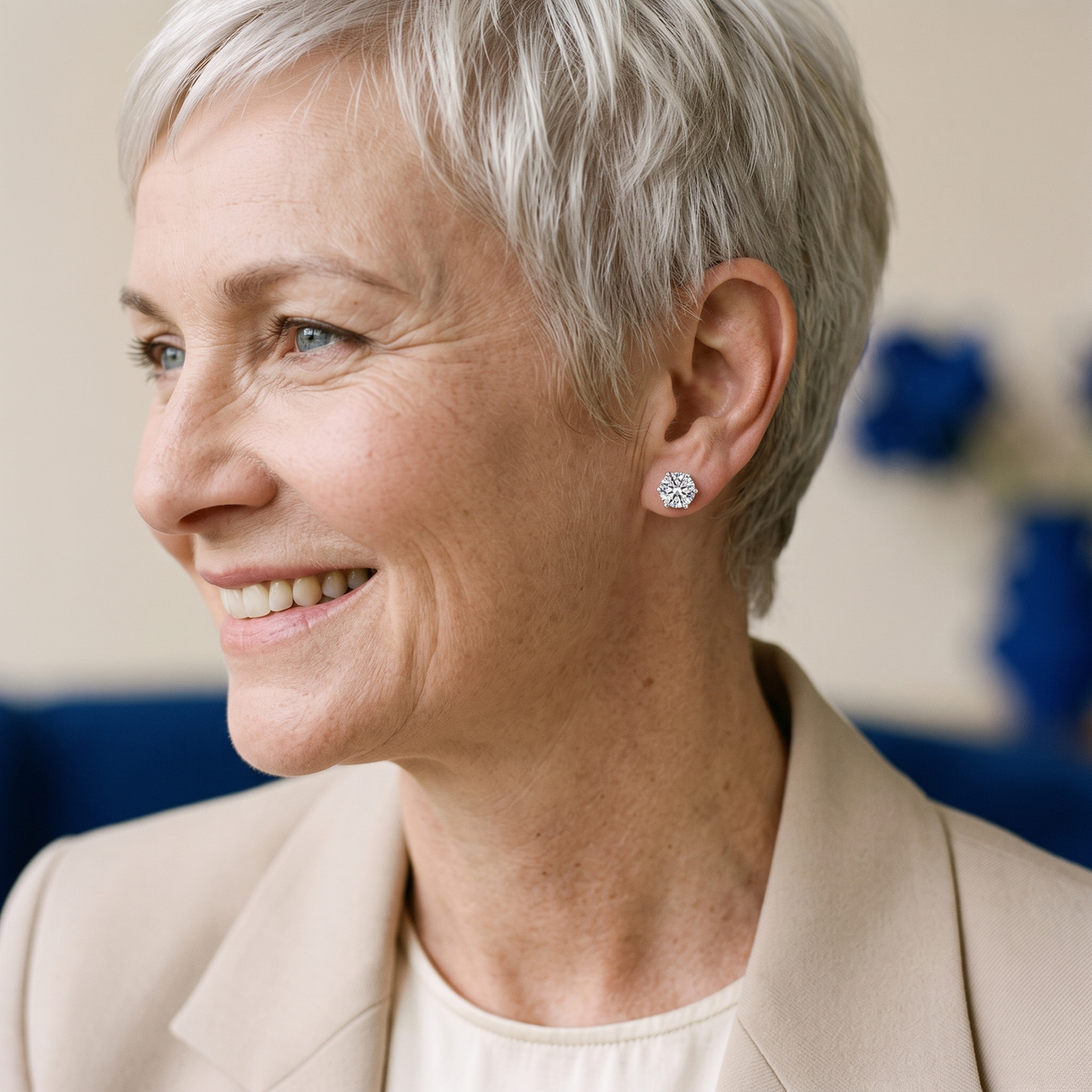 Sirius Moissanite Solitaire Studs, worn by a woman