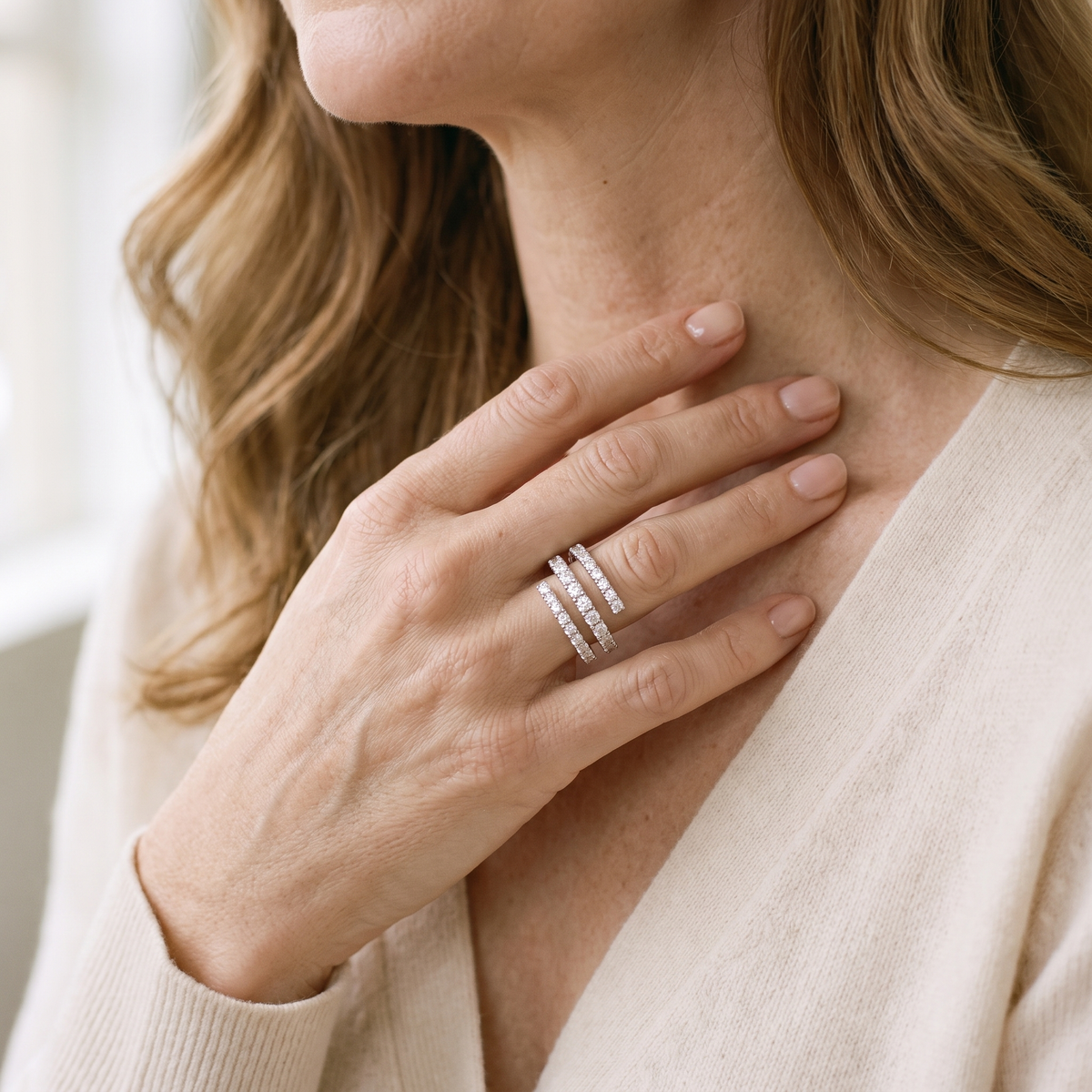 Spirale Moissanite Triple Wrap Ring, worn by a woman