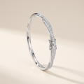 Torsade Moissanite Twist Bangle in White Gold