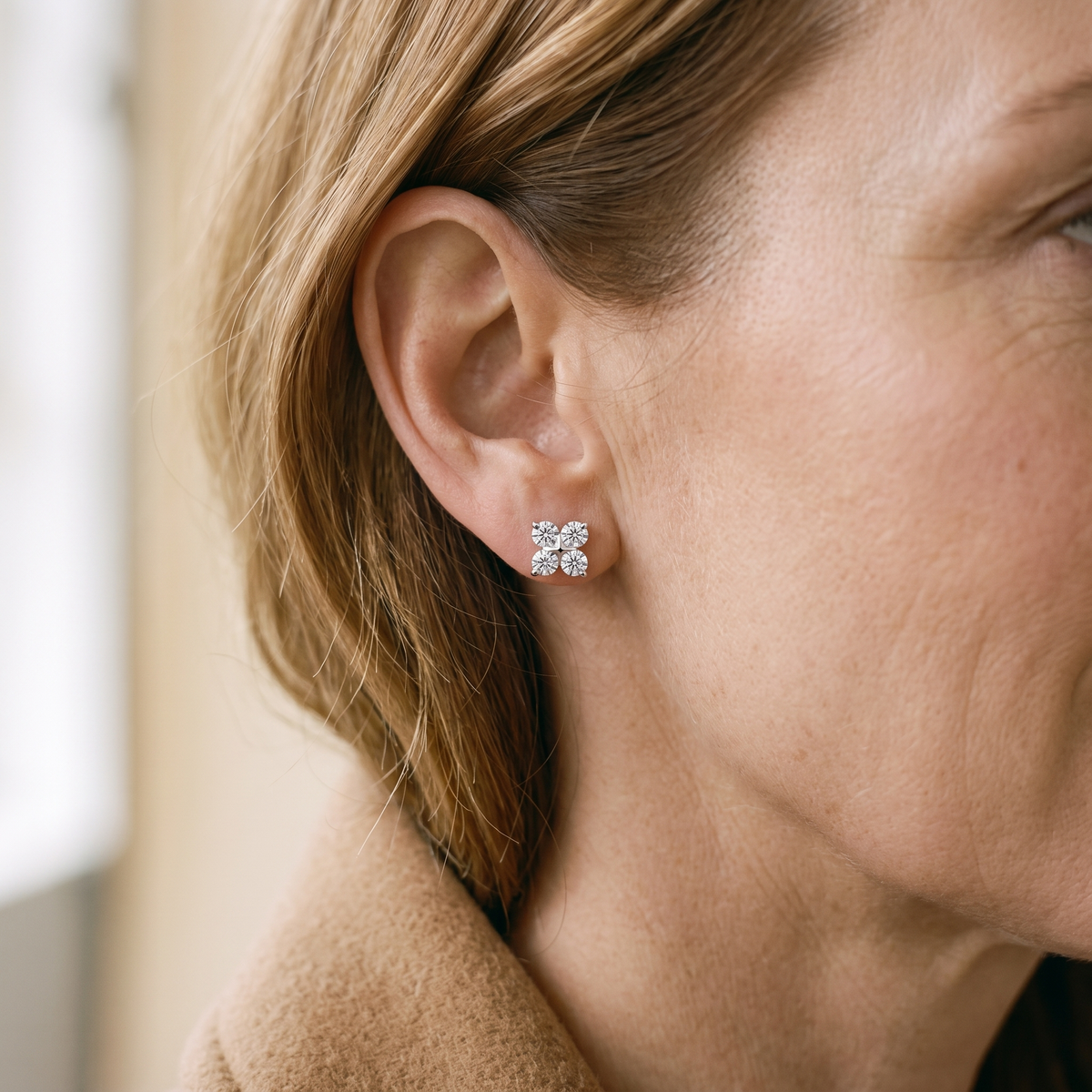 Trèfle Moissanite Four-Leaf Clover Studs, worn by a woman