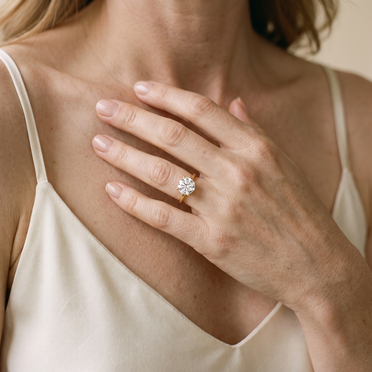 Véga Moissanite Solitaire Ring, 14K Gold Filled, worn by a woman